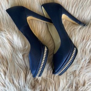 Fancy satin navy blue heel with rhinestone detail